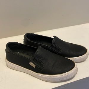 Black faux leather Guess slip on shoes